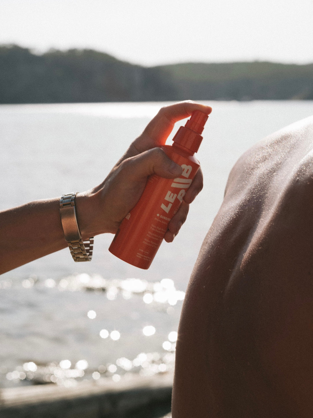 Le Rub Sunscreen Oil SPF50 applied by the sea in Ibiza