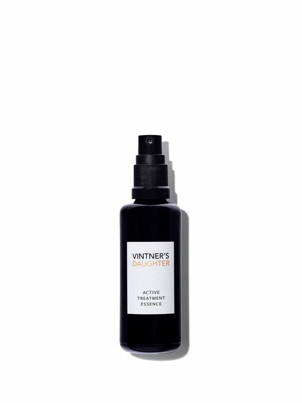 Black bottle of Vintner's Daughter Active Treatment Essence on a white background