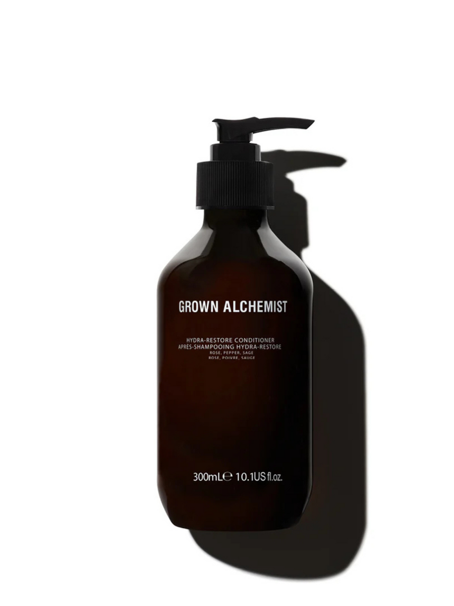 Hydra Restore Conditioner Grown Alchemist Packshot on withe background with shadow
