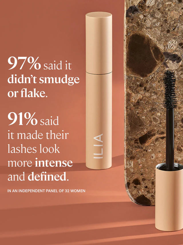 ILIA mascara with text on a brown background