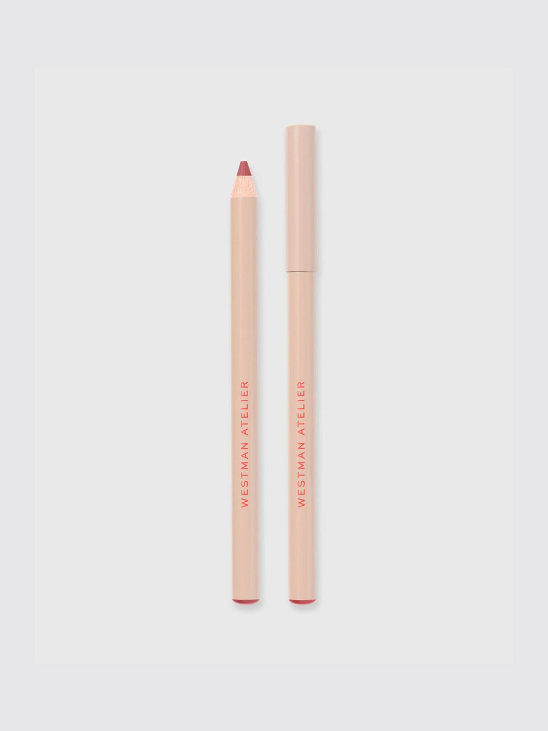 Lip liner pencil and case on a light gray background