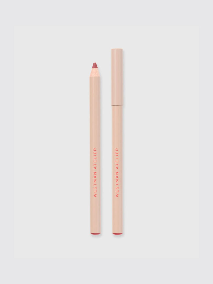 Lip liner pencil and case on a light gray background