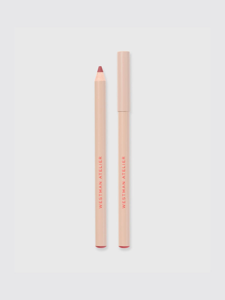 Lip liner pencil and case on a light gray background
