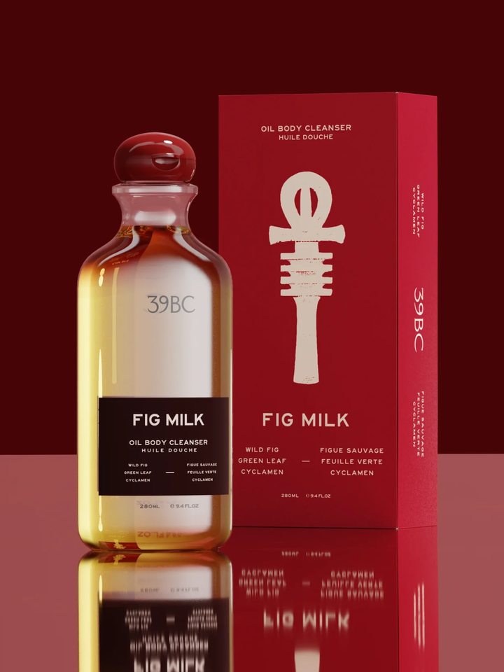 Bottle and box of 39BC Fig Milk oil body cleanser on a red background