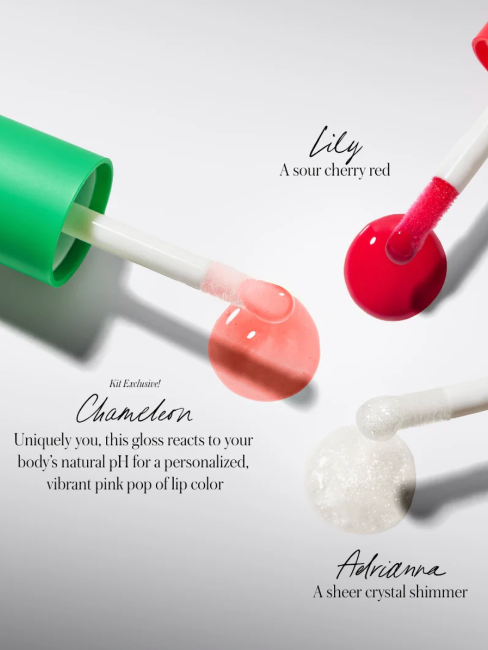 Three lip glosses with different shades on a white background